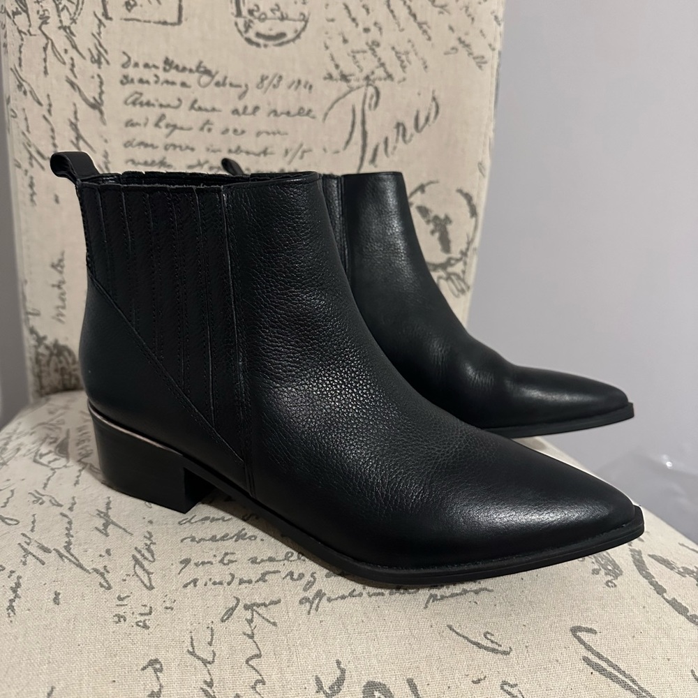 Never warn black leather booties